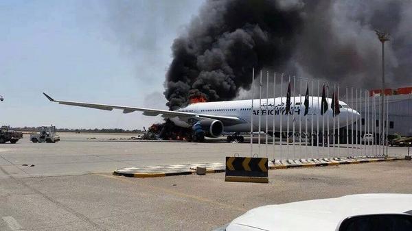 Afriqiyah Airways Airbus A330-200 is hit by a rocket and burns at